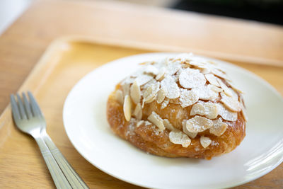 Close-up of bread in plate on table