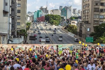 High angle view of crowds on street during brazilian carnival