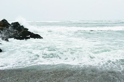 Scenic view of sea against clear sky