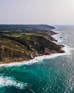 Scenic view of sea against clear sky