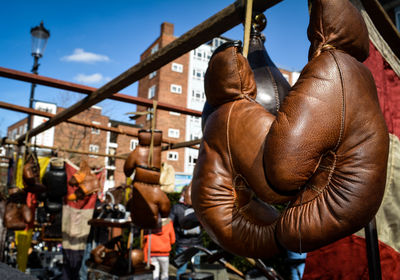 Boxing gloves hanging at market stall