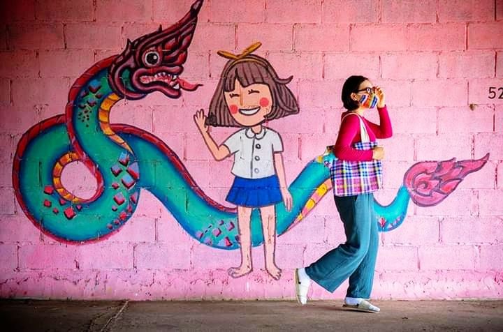 creativity, wall - building feature, full length, art, graffiti, child, mural, multi colored, street art, childhood, women, cartoon, representation, adult, wall, female, architecture, animal, two people, drawing, animal representation