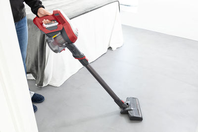 High angle view of person working on floor at home