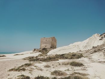 Built structure against clear blue sky