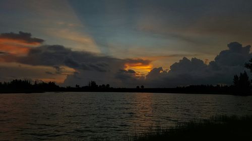 Scenic view of sea at sunset