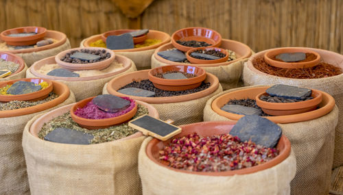 Various spices and flavorings in bowls and bags