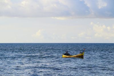 Boat sailing in sea