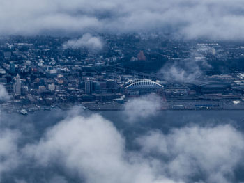 Aerial view of cityscape against sky