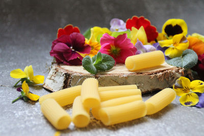Close-up of yellow flowers on table