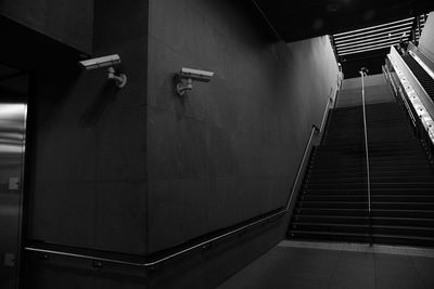 Low angle view of illuminated staircase in subway station