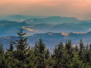 Scenic view of mountains against sky during sunset