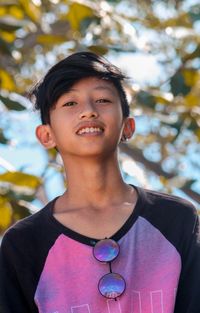 Portrait of a smiling young man looking away