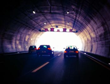 Cars on road in tunnel