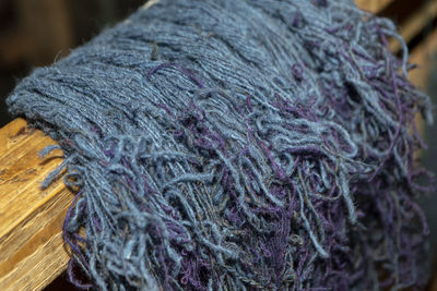 High angle view of string on wood