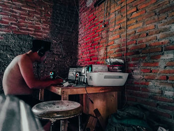 Man working on wall