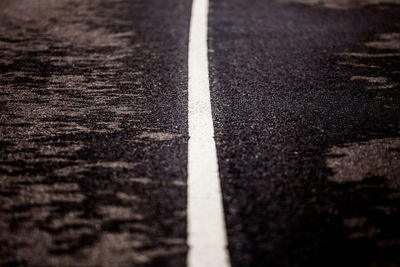 Detail shot of white line on road