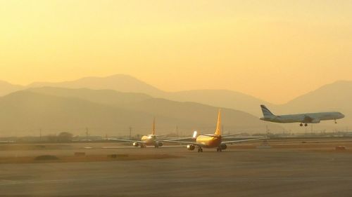 Scenic view of mountains at sunset