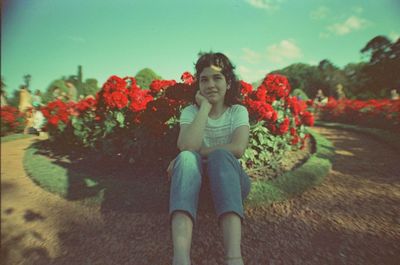 Portrait of girl sitting outdoors