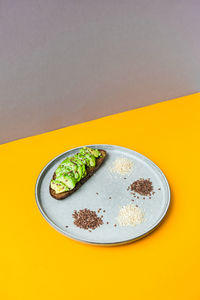 Ingredients for healthy avocado toast. sesame flax seeds. vegan keto diet. healthy eating. vegetari