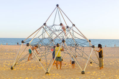 View of swing on beach