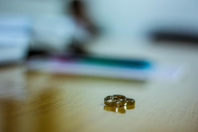 Close-up of gold colored on table