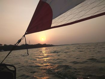 Scenic view of sea against clear sky during sunset
