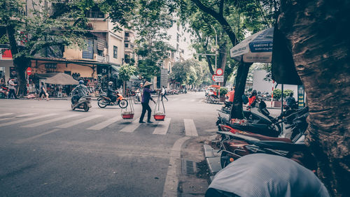 People on street in city