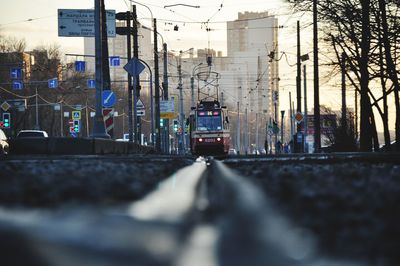 Surface level of railroad tracks by street in city