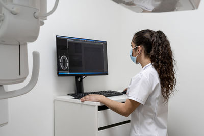 Nurse working on computer in maxillofacial clinic