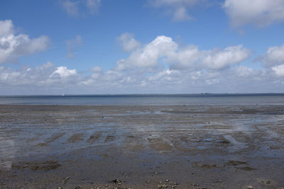 Scenic view of beach against sky