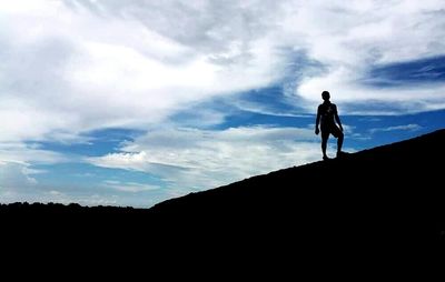 Woman standing on mountain