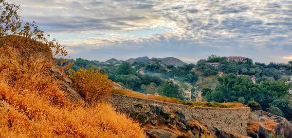 Scenic view of landscape against sky during autumn