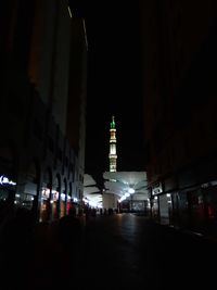 Low angle view of illuminated buildings at night