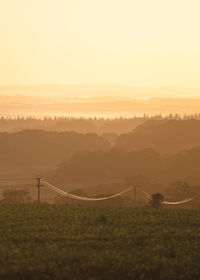 Scenic view of landscape against sky during sunset