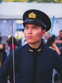 Portrait of man standing outdoors