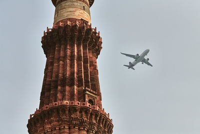 Low angle view of statue against sky