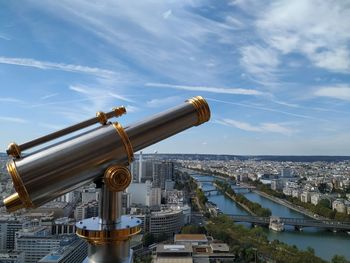 High angle view of cityscape against cloudy sky