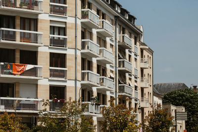 Low angle view of residential building against sky