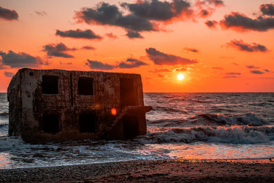 Scenic view of sea against sky during sunset