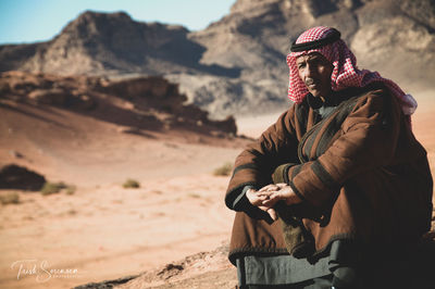 Man standing on snow covered land