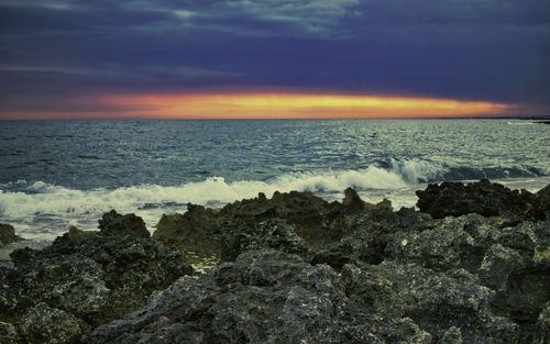 Scenic view of sea against sky during sunset