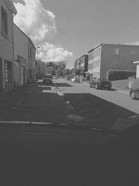 View of road along buildings