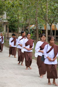 Group of people walking outdoors