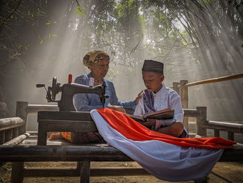 People sitting outdoors