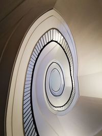 Low angle view of spiral staircase in building