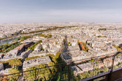 High angle view of crowd in city against sky