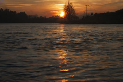 Scenic view of sunset over water