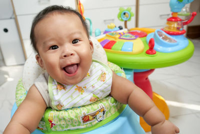 Portrait of cute baby boy smiling