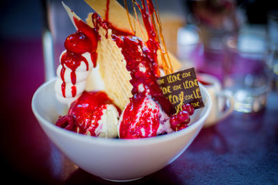 Close-up of strawberries in bowl on table