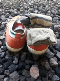 High angle view of pebbles on rocks